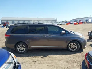 2012 Toyota Sienna XLE AAS with VIN 5TDYK3DC9CS227319, listed as a IAAI auction lot 41773806 with 178,803 mi miles and . Bid and sale history available at carsss.com. Image 13.
