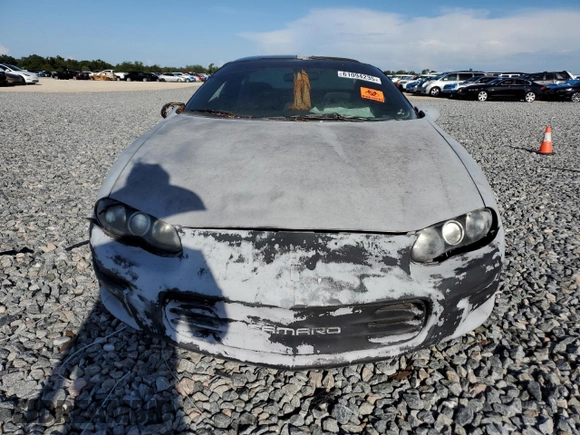 1999 Chevrolet Camaro z VIN 2G1FP22K4X2119705, wystawiony jako Copart lot #61094235 z przebiegiem Nie podano mil oraz Czysty tytuł • Clean title. Historia ofert i sprzedaży dostępna na DreamBid. Obrazek 5.