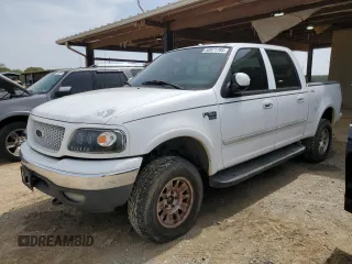 2001 Ford F-150 SuperCrew XLT with VIN 1FTRW08L11KA06657, listed as a Copart auction lot 50871785 with 292,711 mi miles and Clean Title. Bid and sale history available at carsss.com. Image 1.