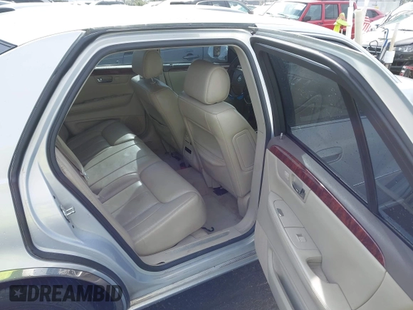 2006 Cadillac DTS w/1SC with VIN 1G6KD57Y56U101903, listed as a IAAI auction lot 41710160 with 151,057 mi miles. Bid and sale history available at carsss.com. Image 8.