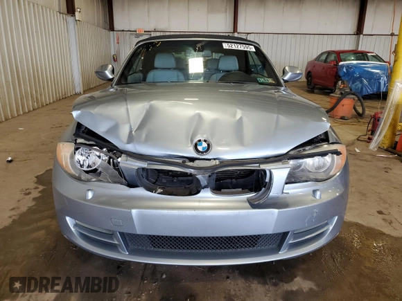 2011 BMW 1 Series 128i with VIN WBAUL7C57BVM80274, listed as a Copart auction lot 52127595 with 104,952 mi miles and Salvage title. Bid and sale history available at DreamBid. Image 5.
