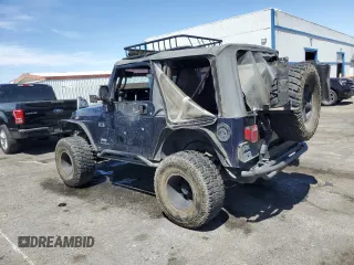 2004 Jeep Wrangler X with VIN 1J4FA39S64P721072, listed as a Copart auction lot 57512865 with Not provided miles and Clean title. Bid and sale history available at DreamBid. Image 2.