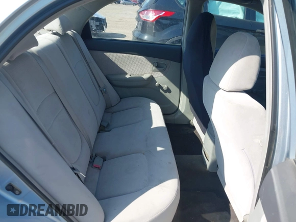 2007 Kia Spectra EX with VIN KNAFE121175389331, listed as a IAAI auction lot 42078709 with 199,324 mi miles. Bid and sale history available at carsss.com. Image 8.
