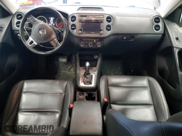 2015 Volkswagen Tiguan SE z VIN WVGBV7AX8FW574023, wystawiony jako Copart lot #50027465 z przebiegiem 101 145 mil mil oraz Czysty tytuł • Clean title. Historia ofert i sprzedaży dostępna na DreamBid. Obrazek 8.