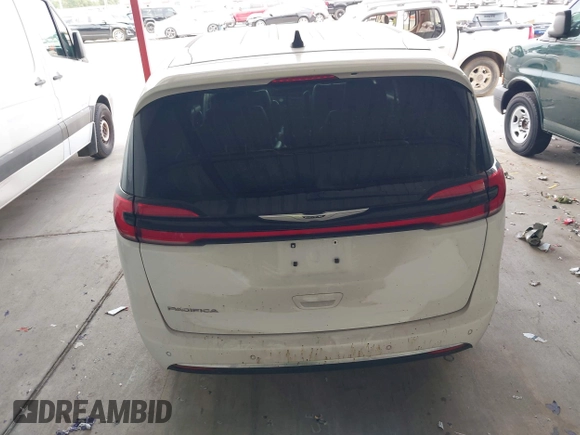 2023 Chrysler Pacifica Touring L with VIN 2C4RC1BG6PR550575, listed as a IAAI auction lot 42576498 with 54,373 mi miles and . Bid and sale history available at DreamBid. Image 19.