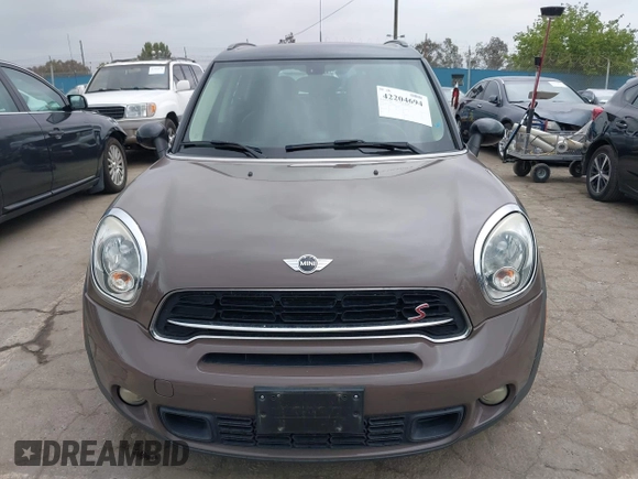 2015 MINI Countryman S z VIN WMWZC3C53FWT02232, wystawiony jako IAAI lot #42204694 z przebiegiem 107 544 mil mil oraz . Historia ofert i sprzedaży dostępna na DreamBid. Obrazek 6.