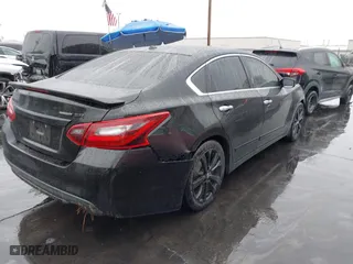 2018 Nissan Altima 2.5 SL with VIN 1N4AL3AP4JC288183, listed as a IAAI auction lot 41466582 with 100,858 mi miles. Bid and sale history available at carsss.com. Image 4.