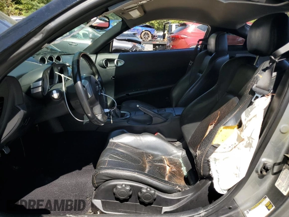 2004 Nissan 350Z Touring with VIN JN1AZ34E54T052703, listed as a Copart auction lot 70016184 with 170,619 mi miles and Salvage Title. Bid and sale history available at carsss.com. Image 7.