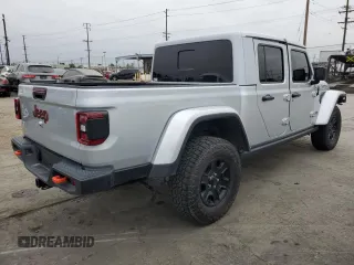 2023 Jeep Gladiator Mojave z VIN 1C6JJTEG9PL587727, wystawiony jako Copart lot #66034185 z przebiegiem 28 776 mil mil oraz Szkoda całkowita • Salvage title. Historia ofert i sprzedaży dostępna na DreamBid. Obrazek 3.