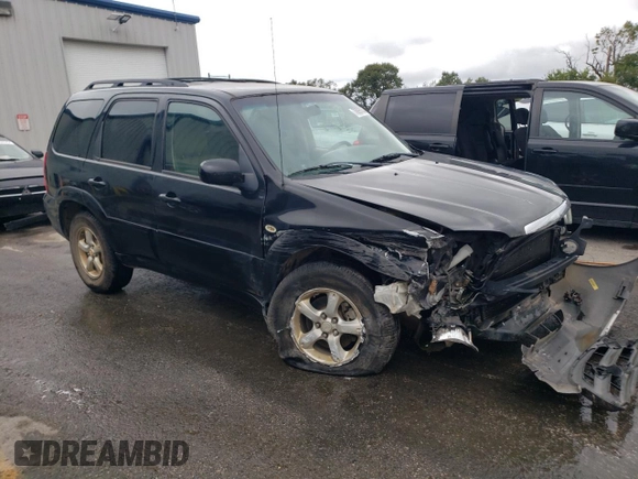 2005 Mazda Tribute S with VIN 4F2YZ04195KM65089, listed as a Copart auction lot 70993244 with Not Provided miles and Salvage Title. Bid and sale history available at DreamBid. Image 4.