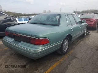 1997 Mercury Grand Marquis GS z VIN 2MELM74W7VX687221, wystawiony jako Copart lot #78665224 z przebiegiem 226 077 mil mil oraz Szkoda całkowita • Salvage title. Historia ofert i sprzedaży dostępna na DreamBid. Obrazek 3.