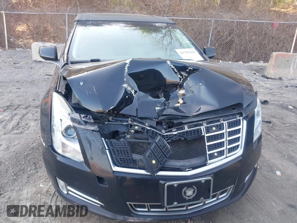 2013 Cadillac XTS Premium z VIN 2G61S5S38D9199459, wystawiony jako IAAI lot #41787638 z przebiegiem 171 298 mil mil oraz . Historia ofert i sprzedaży dostępna na DreamBid. Obrazek 12.