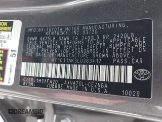 2020 Toyota Camry LE with VIN 4T1C11AK3LU363417, listed as a IAAI auction lot 41430382 with 130,837 mi miles. Bid and sale history available at carsss.com. Image 9.