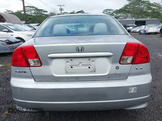 2005 Honda Civic LX with VIN 2HGES16545H568037, listed as a IAAI auction lot 41785307 with 170,913 mi miles and . Bid and sale history available at DreamBid. Image 16.