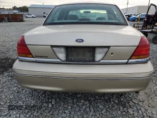 1999 Ford Crown Victoria z VIN 2FAFP73W4XX137040, wystawiony jako Copart lot #83741244 z przebiegiem 142 901 mil mil oraz Szkoda całkowita • Salvage title. Historia ofert i sprzedaży dostępna na DreamBid. Obrazek 6.