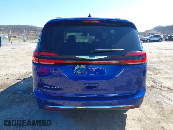 2021 Chrysler Pacifica Touring with VIN 2C4RC1FG5MR511546, listed as a IAAI auction lot 41882085 with 85,635 mi miles and . Bid and sale history available at DreamBid. Image 17.