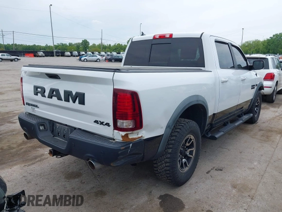 2016 Ram 1500 Rebel with VIN 1C6RR7YTXGS417801, listed as a IAAI auction lot 42382016 with 142,636 mi miles and . Bid and sale history available at DreamBid. Image 4.