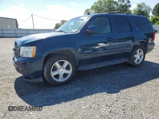 2007 Chevrolet Tahoe LTZ with VIN 1GNFC13J57R181007, listed as a Copart auction lot 56376455 with 202,161 mi miles and Salvage title. Bid and sale history available at DreamBid. Image 1.