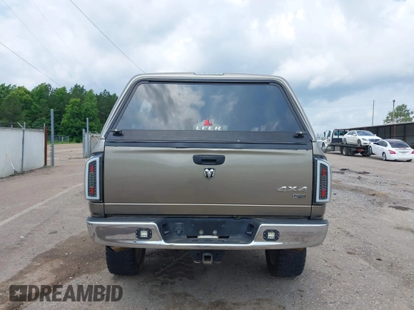 2007 Dodge 1500 Laramie with VIN 1D7HU18277S182772, listed as a IAAI auction lot 42282881 with 163,790 mi miles and . Bid and sale history available at DreamBid. Image 18.