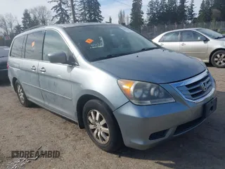 2009 Honda Odyssey EX-L with VIN 5FNRL38739B034384, listed as a IAAI auction lot 41891530 with 216,659 mi miles. Bid and sale history available at carsss.com. Image 1.