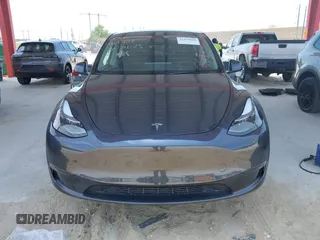 2024 Tesla Model Y Long Range z VIN 7SAYGDEE7RA229591, wystawiony jako IAAI lot #42194044 z przebiegiem 22 866 mil mil oraz . Historia ofert i sprzedaży dostępna na DreamBid. Obrazek 12.