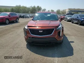 2021 Cadillac XT4 FWD Sport with VIN 1GYFZER49MF057541, listed as a Copart auction lot 70654544 with 35,441 mi miles and Non Repairable. Bid and sale history available at DreamBid. Image 14.