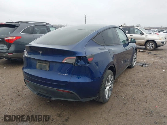 2023 Tesla Model Y Long Range with VIN 7SAYGDEE4PA064743, listed as a IAAI auction lot 41523760 with 41,113 mi miles. Bid and sale history available at carsss.com. Image 4.
