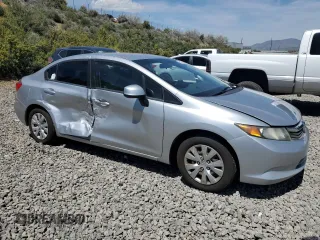 2012 Honda Civic LX z VIN 19XFB2F53CE373385, wystawiony jako Copart lot #51335755 z przebiegiem 188 159 mil mil oraz Szkoda całkowita • Salvage title. Historia ofert i sprzedaży dostępna na DreamBid. Obrazek 4.