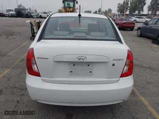 2009 Hyundai Accent Auto GLS with VIN KMHCN46C79U333109, listed as a IAAI auction lot 42023502 with 230,123 mi miles. Bid and sale history available at carsss.com. Image 16.