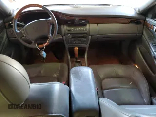 2002 Cadillac DeVille DTS with VIN 1G6KF57952U303332, listed as a Copart auction lot 61852523 with 173,500 mi miles and Clean Title. Bid and sale history available at carsss.com. Image 8.
