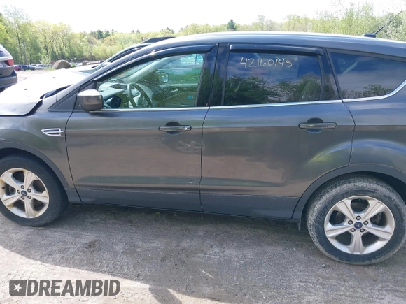 2016 Ford Escape SE z VIN 1FMCU9GX2GUA47702, wystawiony jako IAAI lot #42160145 z przebiegiem 90 765 mil mil oraz . Historia ofert i sprzedaży dostępna na DreamBid. Obrazek 15.