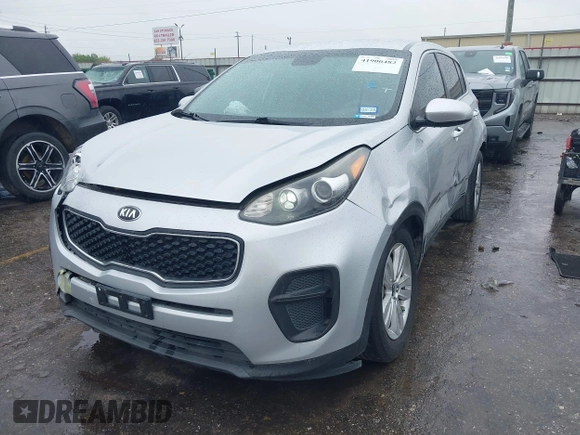 2018 Kia Sportage LX with VIN KNDPM3AC7J7337951, listed as a IAAI auction lot 41900482 with 105,857 mi miles and . Bid and sale history available at carsss.com. Image 17.