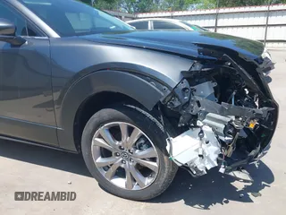 2022 Mazda CX-30 S Premium with VIN 3MVDMBDL5NM416649, listed as a IAAI auction lot 41990745 with 13,923 mi miles and . Bid and sale history available at DreamBid. Image 18.
