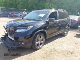 2021 Honda Passport Touring z VIN 5FNYF8H96MB014947, wystawiony jako IAAI lot #42150399 z przebiegiem 47 499 mil mil oraz . Historia ofert i sprzedaży dostępna na DreamBid. Obrazek 2.