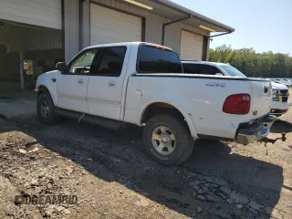 2003 Ford F-150 XLT with VIN 1FTRW08L23KD65857, listed as a Copart auction lot 71634004 with 321,505 mi miles and Clean Title. Bid and sale history available at carsss.com. Image 2.