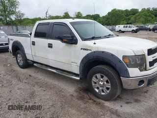 2011 Ford F-150 XLT with VIN 1FTFW1ET1BKD79504, listed as a IAAI auction lot 42307381 with 167,695 mi miles and . Bid and sale history available at DreamBid. Image 1.