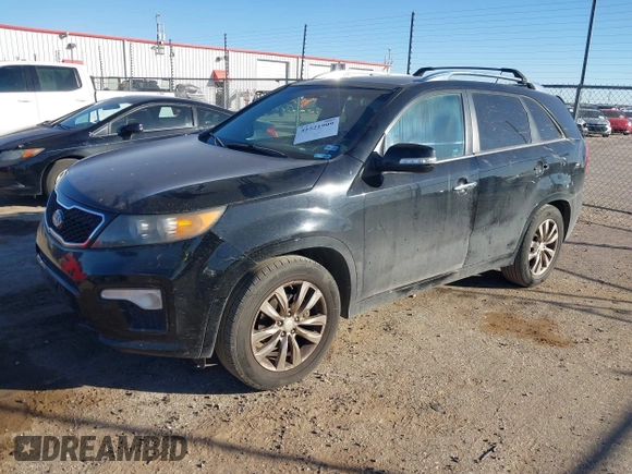 2012 Kia Sorento SX with VIN 5XYKW4A26CG207358, listed as a IAAI auction lot 41521909 with 215,689 mi miles. Bid and sale history available at carsss.com. Image 2.