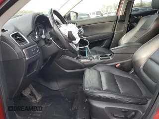 2016 Mazda CX-5 Grand Touring with VIN JM3KE4DY6G0753826, listed as a Copart auction lot 55391555 with 96,852 mi miles and Salvage Title. Bid and sale history available at DreamBid. Image 7.