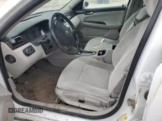2014 Chevrolet Impala LT with VIN 2G1WB5E30E1142857, listed as a Copart auction lot 52650575 with 230,412 mi miles and Salvage Title. Bid and sale history available at DreamBid. Image 7.