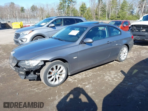 2009 BMW 3 Series 335i xDrive with VIN WBAWC73519E269820, listed as a IAAI auction lot 41794929 with 122,691 mi miles. Bid and sale history available at carsss.com. Image 2.
