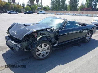 2002 Ford Thunderbird Hardtop Premium z VIN 1FAHP60A82Y103848, wystawiony jako IAAI lot #42467093 z przebiegiem Nie podano mil oraz . Historia ofert i sprzedaży dostępna na DreamBid. Obrazek 20.