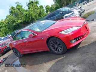 2020 Tesla Model S Long Range with VIN 5YJSA1E25LF396213, listed as a IAAI auction lot 42383231 with 73,125 mi miles and . Bid and sale history available at DreamBid. Image 13.