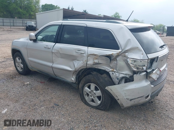 2011 Jeep Grand Cherokee Laredo with VIN 1J4RS4GGXBC564035, listed as a IAAI auction lot 41931861 with 242,291 mi miles and . Bid and sale history available at DreamBid. Image 3.