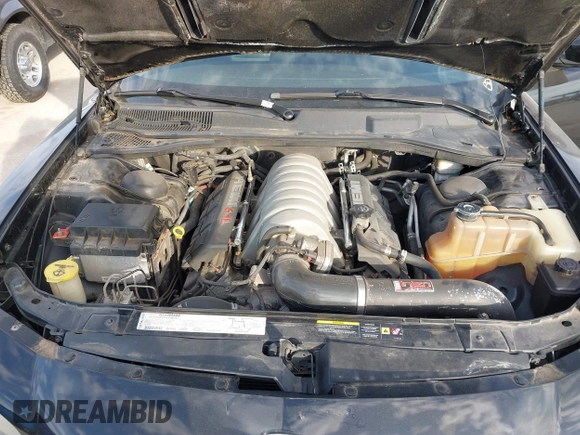 2006 Dodge Charger SRT-8 with VIN 2B3LA73W96H371246, listed as a IAAI auction lot 41676168 with 130,064 mi miles and . Bid and sale history available at carsss.com. Image 10.