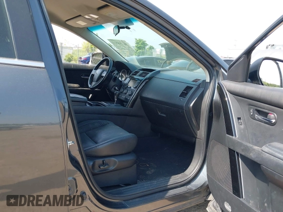 2014 Mazda CX-9 Touring z VIN JM3TB3CA4E0431520, wystawiony jako IAAI lot #42514932 z przebiegiem 119 837 mil mil oraz . Historia ofert i sprzedaży dostępna na DreamBid. Obrazek 5.
