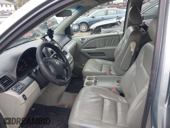 2007 Honda Odyssey EX-L with VIN 5FNRL38617B038017, listed as a IAAI auction lot 41840741 with 208,428 mi miles and . Bid and sale history available at carsss.com. Image 5.