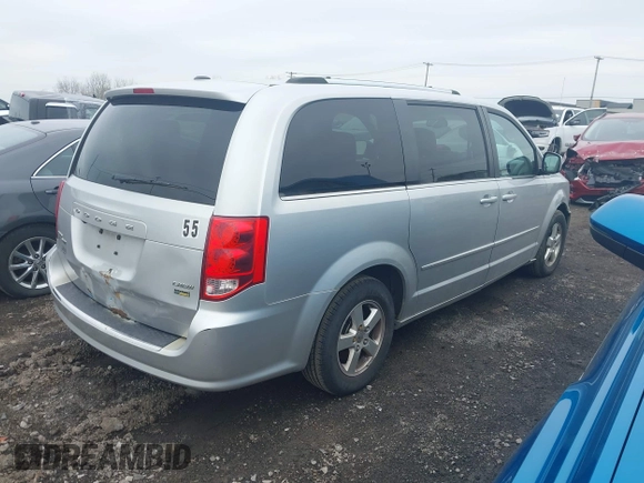 2011 Dodge Grand Caravan Crew with VIN 2D4RN5DGXBR678747, listed as a IAAI auction lot 41899883 with 196,100 mi miles and . Bid and sale history available at DreamBid. Image 4.