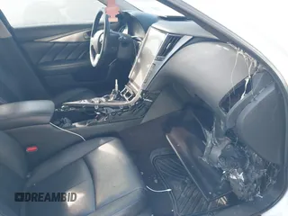 2015 Infiniti Q50 Premium z VIN JN1BV7AR9FM398247, wystawiony jako IAAI lot #42059004 z przebiegiem Nie podano mil oraz . Historia ofert i sprzedaży dostępna na DreamBid. Obrazek 5.