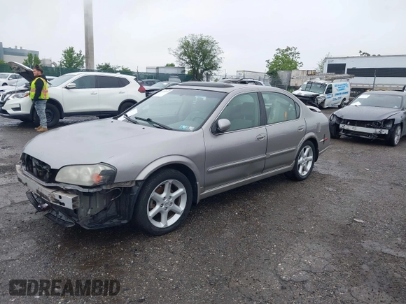 2002 Nissan Maxima GXE z VIN JN1DA31D32T437223, wystawiony jako IAAI lot #42274090 z przebiegiem 111 791 mil mil oraz . Historia ofert i sprzedaży dostępna na DreamBid. Obrazek 2.