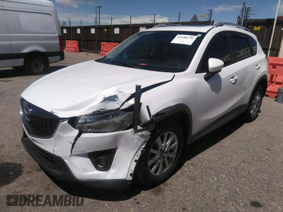 2014 Mazda CX-5 Touring with VIN JM3KE2CY7E0364311, listed as a IAAI auction lot 42108176 with 90,506 mi miles and . Bid and sale history available at DreamBid. Image 2.